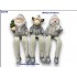 Ceramic figures with hanging legs 9 cm 