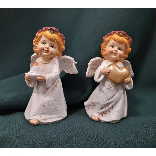 Angyal mosolygós gyertyával/szívvel 10 cm